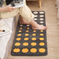 Luxury, light-weight entryway mats with a faux wool coffee table mat and bedside rug.