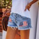 2025 trendy European and American buttoned printed patch denim shorts for women, cross-border trade ripped tassel hot pants wholesale.