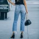 2023 new European and American cross-border spring ripped jeans for women, washed, ripped, raw-edged, beggar pants in stock for wholesale
