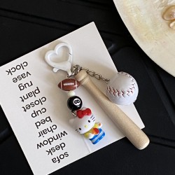Homemade creative table tennis, badminton, KT doll keychain, cartoon sports game racket series bag charm for couples.