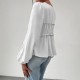 Elegant long-sleeved top, blouse. Loose-fitting V-neck, ruffled hem, contrasting lace-up design for a slimming, versatile shirt.