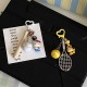 Homemade creative table tennis, badminton, KT doll keychain, cartoon sports game racket series bag charm for couples.
