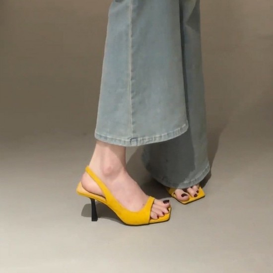 Women's square-toed, open-toe sandals, summer French-style, stiletto, slingback black high heels with skirts. Women's square-toed, open-toe sandals, summer French-style, stiletto, slingback black high heels with skirts.