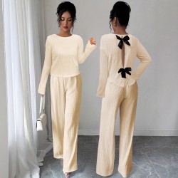 Women's suit with a hollowed-out bow at the back, 2025 summer elegant round-neck long-sleeved top and trousers, two-piece set.