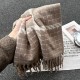 A new cross-border thickened plaid scarf for autumn and winter, soft and whitening, and a faux cashmere scarf with tassels, ready for wholesale.