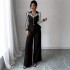 European and American trendy casual suits for women Elegant striped, contrasting color scheme, V-neck long-sleeved shirt and straight-leg trousers, two-piece set.
