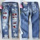 2025 European and American cross-border straight jeans for women, Christmas snowflake print patchwork ripped denim pants in stock