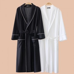 New autumn and winter coral fleece pajamas for men and women, thickened fleece couple's nightgown with pants for winter warmth.