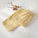 Summer pure cotton men's and women's washed cotton plaid shorts, thin cotton beach pants, outdoor wear. Summer pure cotton men's and women's washed cotton plaid shorts, thin cotton beach pants, outdoor wear.