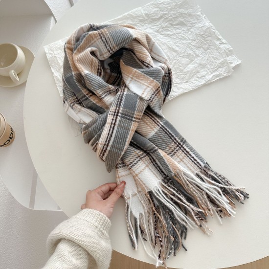 A versatile pink dotted plaid scarf for autumn and winter, perfect for couples, with a tasseled design for warmth.