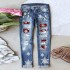 2025 European and American cross-border straight jeans for women, Christmas snowflake print patchwork ripped denim pants in stock