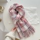 A versatile pink dotted plaid scarf for autumn and winter, perfect for couples, with a tasseled design for warmth.