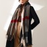 Women's wholesale winter scarves, 2025 new plaid print, tasseled faux cashmere scarves, fashionable and warm shawls.