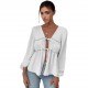 Elegant long-sleeved top, blouse. Loose-fitting V-neck, ruffled hem, contrasting lace-up design for a slimming, versatile shirt.