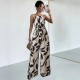 2025 Spring/Summer European and American style wide-leg trousers for women, fashionable printed waist-slimming halter-neck jumpsuit for women.