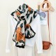 New European and American leopard print bow-knotted long scarves, versatile, high-end thin outerwear shawls for women, wholesale.