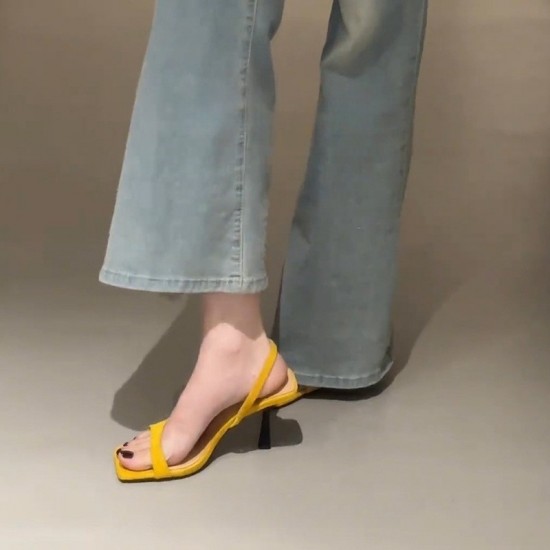 Women's square-toed, open-toe sandals, summer French-style, stiletto, slingback black high heels with skirts. Women's square-toed, open-toe sandals, summer French-style, stiletto, slingback black high heels with skirts.