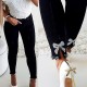 Factory direct cross-border European and American slim-fit jeans for women, butterfly-embellished, beaded slit skinny pencil pants