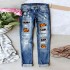 European and American cross-border AliExpress trendy Halloween pumpkin ripped print jeans for women, mid-rise straight-leg pants