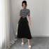 Striped contrasting turtleneck midi skirts for women, elegant slimming and flattering two-piece commuter suits.
